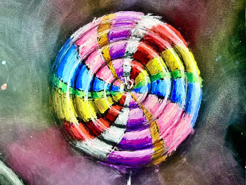 A pastel drawing of a lollipop.