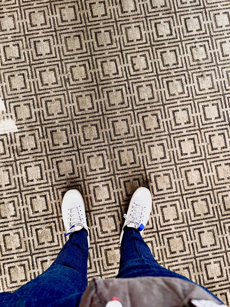 Shoegazing on geometric carpet.